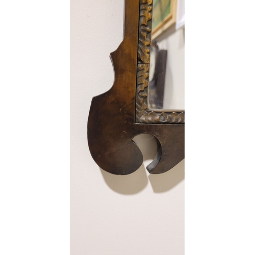 113 - A GOOD QUALITY EARLY 20TH CENTURY GEORGIAN STYLE WALNUT & GILTWOOD MIRROR, lovely scroll shape to th... 