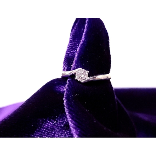 15 - A BEAUTIFUL 18CT WHITE GOLD DIAMOND SOLITAIRE RING, with a crossover setting, 18ct white gold band. ... 