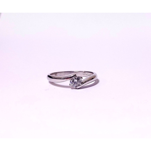 15 - A BEAUTIFUL 18CT WHITE GOLD DIAMOND SOLITAIRE RING, with a crossover setting, 18ct white gold band. ... 
