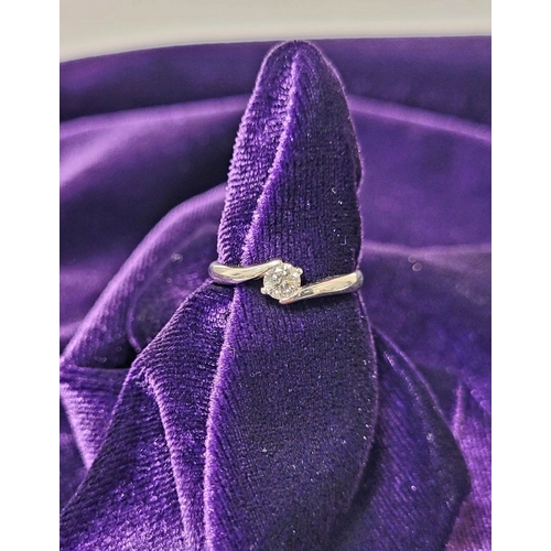 15 - A BEAUTIFUL 18CT WHITE GOLD DIAMOND SOLITAIRE RING, with a crossover setting, 18ct white gold band. ... 