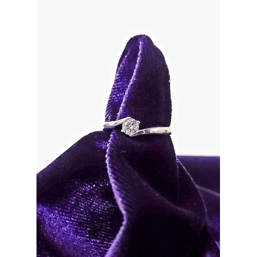 15 - A BEAUTIFUL 18CT WHITE GOLD DIAMOND SOLITAIRE RING, with a crossover setting, 18ct white gold band. ... 