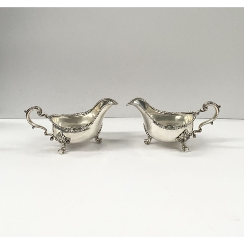 2 - AN EXCEPTIONAL PAIR OF IRISH GEORGE III SILVER SAUCEBOATS, by Thomas Jones, Dublin c.1770. The pair ... 