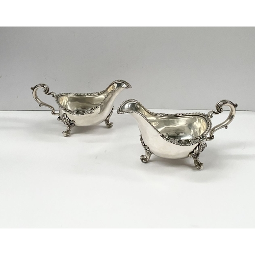 2 - AN EXCEPTIONAL PAIR OF IRISH GEORGE III SILVER SAUCEBOATS, by Thomas Jones, Dublin c.1770. The pair ... 