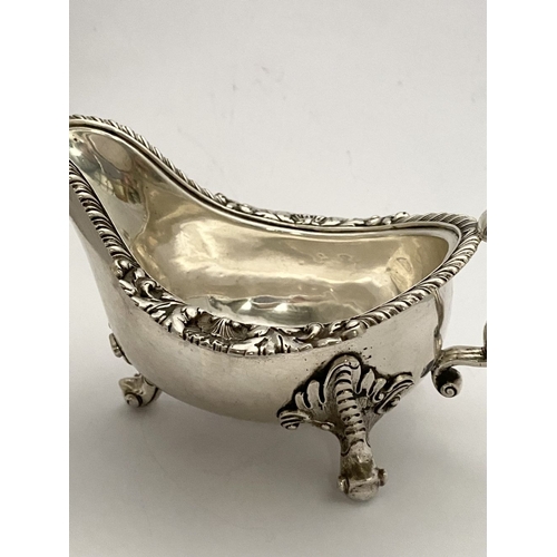 2 - AN EXCEPTIONAL PAIR OF IRISH GEORGE III SILVER SAUCEBOATS, by Thomas Jones, Dublin c.1770. The pair ... 