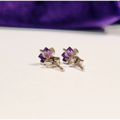 23 - A PRETTY PAIR OF 18CT WHITE GOLD PRINCESS CUT AMETHYST STUD EARRINGS, a gorgeous bright purple tone ... 
