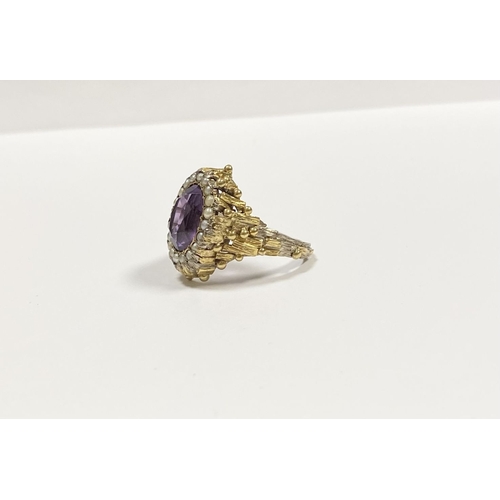 25 - A STUNNING ANTIQUE 18CT GOLD AMETHYST & SEED PEARL CLUSTER RING, with central large oval cut amethys... 