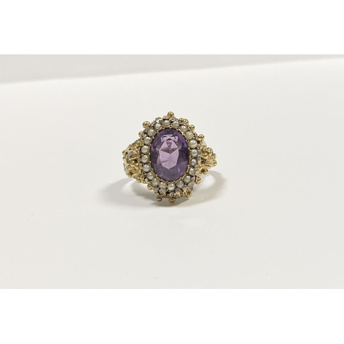 25 - A STUNNING ANTIQUE 18CT GOLD AMETHYST & SEED PEARL CLUSTER RING, with central large oval cut amethys... 