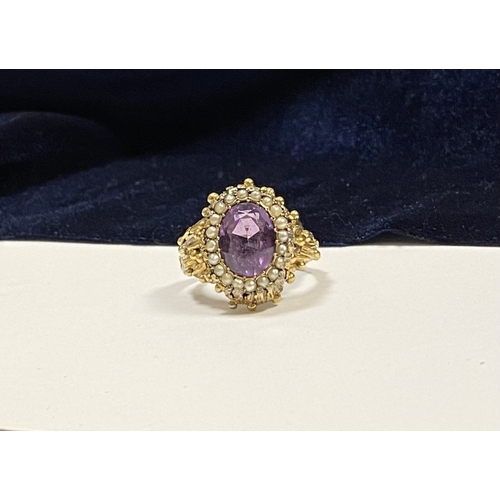 25 - A STUNNING ANTIQUE 18CT GOLD AMETHYST & SEED PEARL CLUSTER RING, with central large oval cut amethys... 