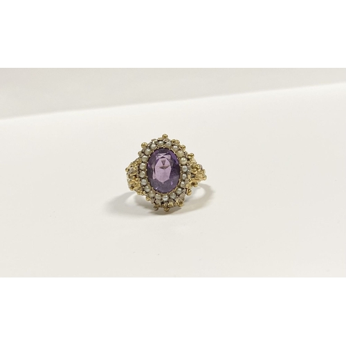 25 - A STUNNING ANTIQUE 18CT GOLD AMETHYST & SEED PEARL CLUSTER RING, with central large oval cut amethys... 