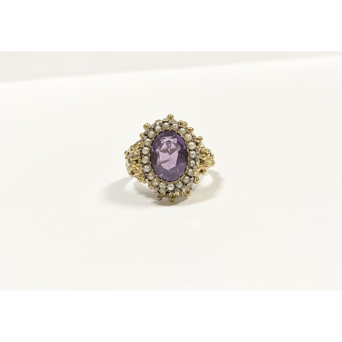 25 - A STUNNING ANTIQUE 18CT GOLD AMETHYST & SEED PEARL CLUSTER RING, with central large oval cut amethys... 