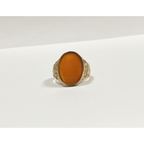 39 - A REALLY BEAUTIFUL 9CT YELLOW GOLD CARNELIAN SIGNET RING, with central large oval cut Carnelian, in ... 