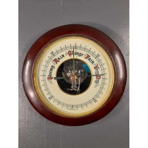 65 - A VINTAGE ANEROID BAROMETER, made in West Germany. Dimensions: 19cm diameter approx.