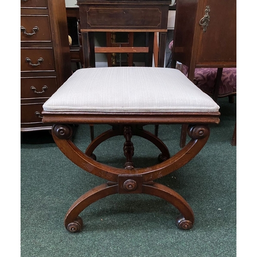 66 - A 19TH CENTURY MAHOGANY AND UPHOLSTERED STOOL the square upholstered seat on X-shaped supports with ... 