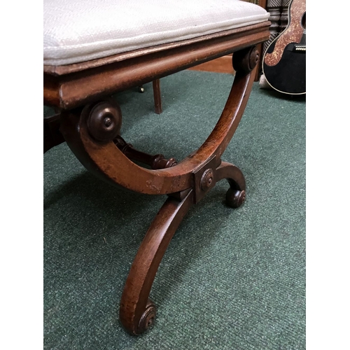66 - A 19TH CENTURY MAHOGANY AND UPHOLSTERED STOOL the square upholstered seat on X-shaped supports with ... 