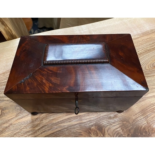 79 - A REGENCY MAHOGANY SARCOPHAGUS SHAPED JEWELLERY BOX, the raised central panel with carved border, th... 