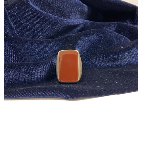 81 - A JOACHIM S’PALIU SPAIN STERLING SILVER CARNELIAN RING, with large rectangular cut Carnelian with ro... 