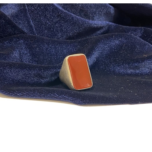 81 - A JOACHIM S’PALIU SPAIN STERLING SILVER CARNELIAN RING, with large rectangular cut Carnelian with ro... 
