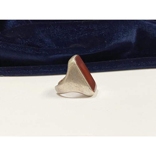 81 - A JOACHIM S’PALIU SPAIN STERLING SILVER CARNELIAN RING, with large rectangular cut Carnelian with ro... 