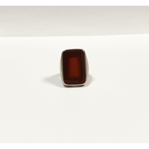 81 - A JOACHIM S’PALIU SPAIN STERLING SILVER CARNELIAN RING, with large rectangular cut Carnelian with ro... 