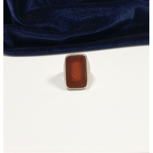 81 - A JOACHIM S’PALIU SPAIN STERLING SILVER CARNELIAN RING, with large rectangular cut Carnelian with ro... 