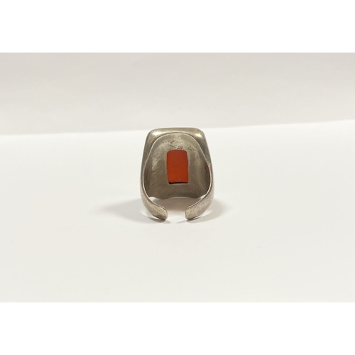 81 - A JOACHIM S’PALIU SPAIN STERLING SILVER CARNELIAN RING, with large rectangular cut Carnelian with ro... 