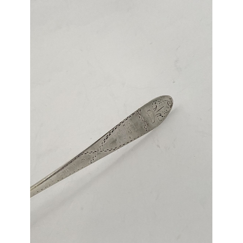 9 - A RARE IRISH – LIMERICK – GEORGE III SILVER SERVING SPOON, by Maurice Fitzgerald c.1785. The handle ... 