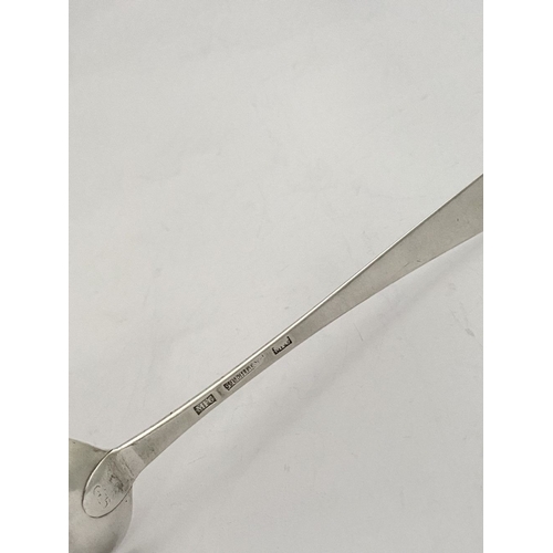 9 - A RARE IRISH – LIMERICK – GEORGE III SILVER SERVING SPOON, by Maurice Fitzgerald c.1785. The handle ... 