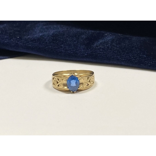 91 - A NICE 9CT YELLOW GOLD MARQUISE CUT SOLITAIRE RING, with central marquise cut vibrant blue gemstone ... 