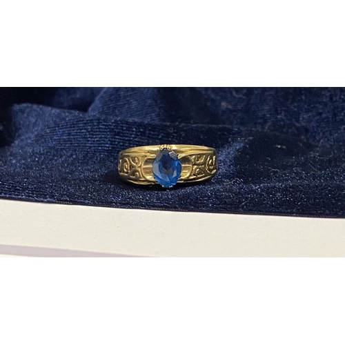 91 - A NICE 9CT YELLOW GOLD MARQUISE CUT SOLITAIRE RING, with central marquise cut vibrant blue gemstone ... 