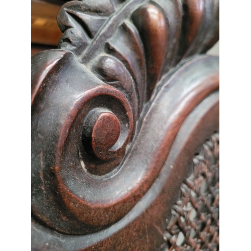 98 - A TALL BACKED SINGLE WILLIAM & MARY OAK HALL CHAIR, with a carved domed crest rail with woven cane b... 