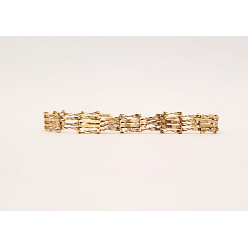 109 - A DELICATE 9CT GOLD GATE LINK BRACELET, with heart shaped lock clasp with security chain attached. L... 