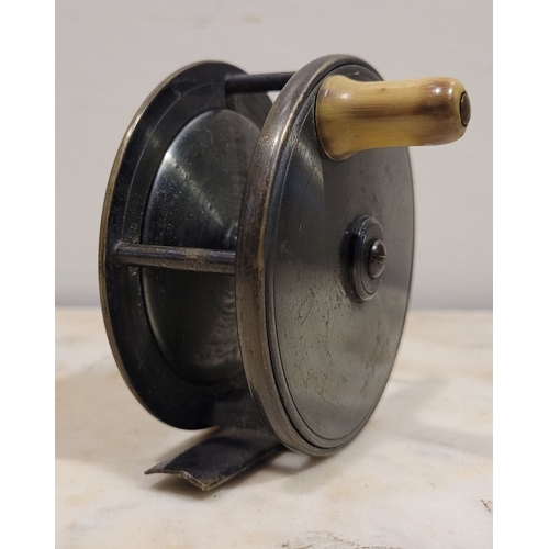 126 - A VINTAGE KELLY & SON OF DUBLIN ALLOY FISHING REEL, engraved to one side: Kelly & Son, Dublin in scr... 