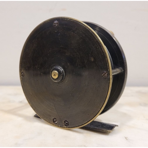 126 - A VINTAGE KELLY & SON OF DUBLIN ALLOY FISHING REEL, engraved to one side: Kelly & Son, Dublin in scr... 