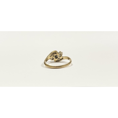 132 - A PRETTY 9CT YELLOW GOLD DIAMOND RING, with three round cut diamonds in illusion setting to centre, ... 