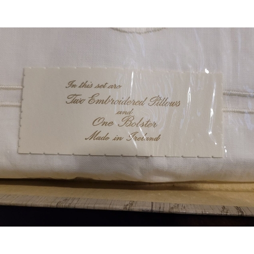 138 - VINTAGE IRISH EMBROIDERED LINEN: a presentation box containing unopened Irish vintage linen, with em... 