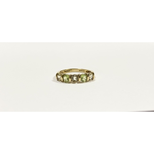 148 - A PRETTY 9CT YELLOW GOLD FIVE STONE RING, with five round cut gemstones alternating in colour in rai... 