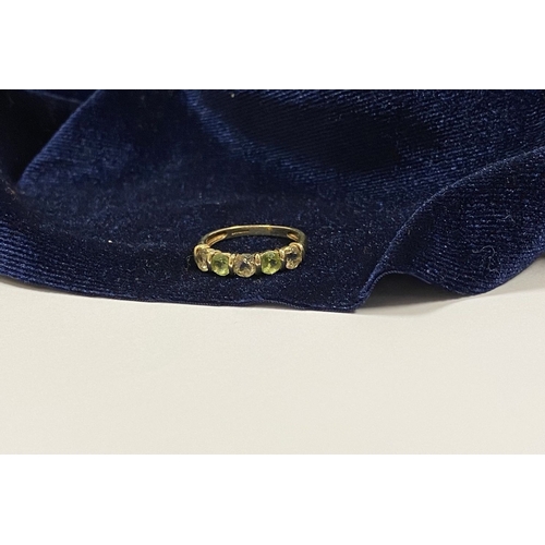 148 - A PRETTY 9CT YELLOW GOLD FIVE STONE RING, with five round cut gemstones alternating in colour in rai... 