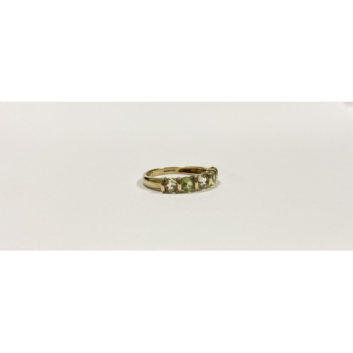 148 - A PRETTY 9CT YELLOW GOLD FIVE STONE RING, with five round cut gemstones alternating in colour in rai... 