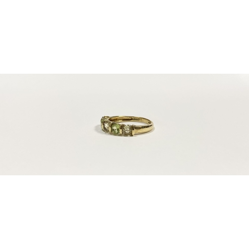 148 - A PRETTY 9CT YELLOW GOLD FIVE STONE RING, with five round cut gemstones alternating in colour in rai... 