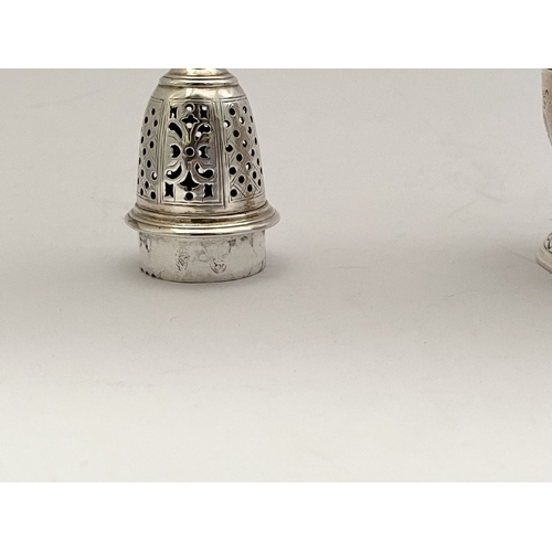 16 - A PAIR OF GEORGE II IRISH SILVER SUGAR CASTORS, Hallmarked Dublin c.1745. Of baluster form, the body... 