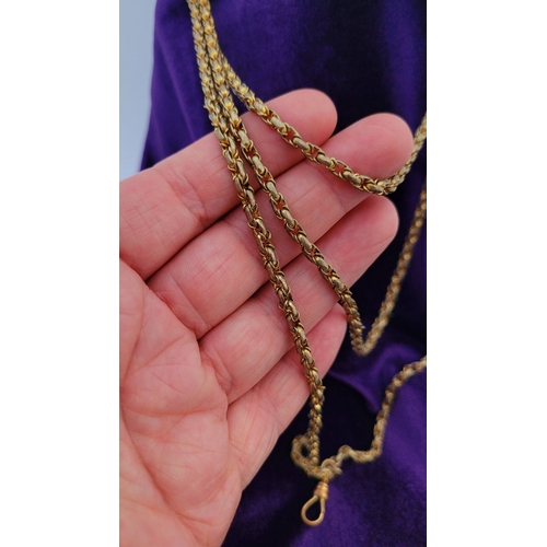 161 - AN ANTIQUE PINCHBECK WATCH CHAIN, 158cm long in total, with a clasp to one end to hold a watch or lo... 