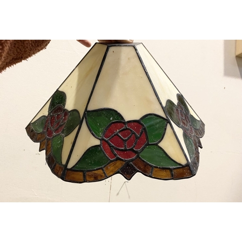 167 - A SET OF FOUR TIFFANY STYLE GLASS WALL SCONCE LAMPSHADES, each features three glass panels with rose... 