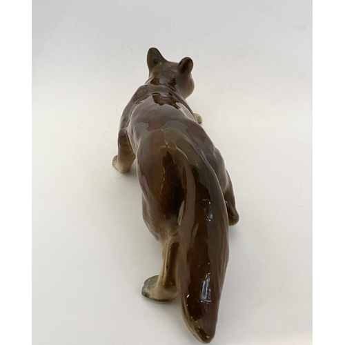 169 - A LARGE VINTAGE BONE CHINA FOX FIGURINE, stamped to base Radnor Works, Longton, Stoke-on-Trent, Engl... 