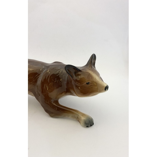 169 - A LARGE VINTAGE BONE CHINA FOX FIGURINE, stamped to base Radnor Works, Longton, Stoke-on-Trent, Engl... 