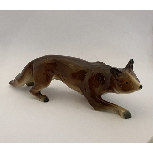 169 - A LARGE VINTAGE BONE CHINA FOX FIGURINE, stamped to base Radnor Works, Longton, Stoke-on-Trent, Engl... 