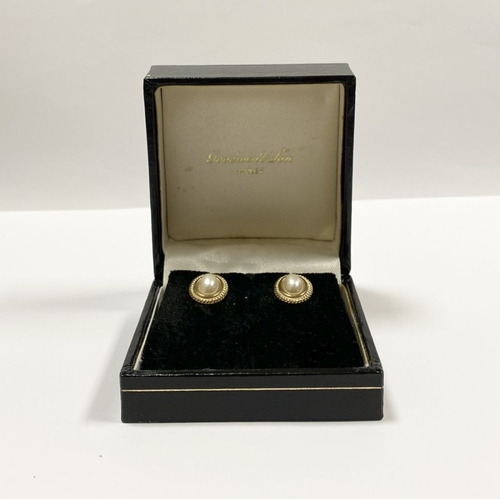 173 - A PRETTY CASED PAIR OF IMITATION PEARL STUD EARRINGS, oval imitation pearls surrounded by tope borde... 