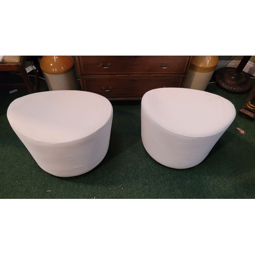 185 - A PAIR OF IKEA STOCKHOLM REVOLVING FOOTSTOOLS, with removable covers. In good condition, covers need... 