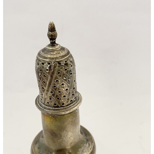 189 - AN EDWARD VII SILVER CASTER, with engraved design to top mounted by finial, hallmarked to body, rais... 