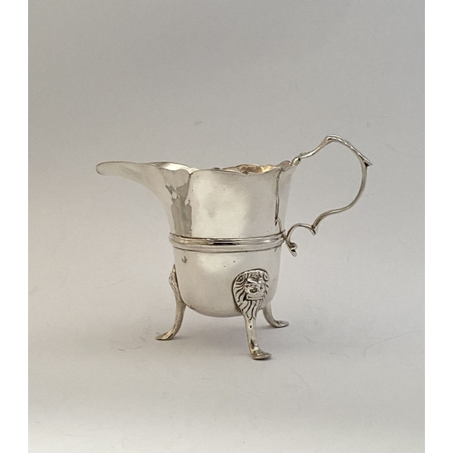 20 - A GEORGE II IRISH SILVER CREAM JUG, Dublin c.1750, nice simple form with gadrooned rim, double scrol... 