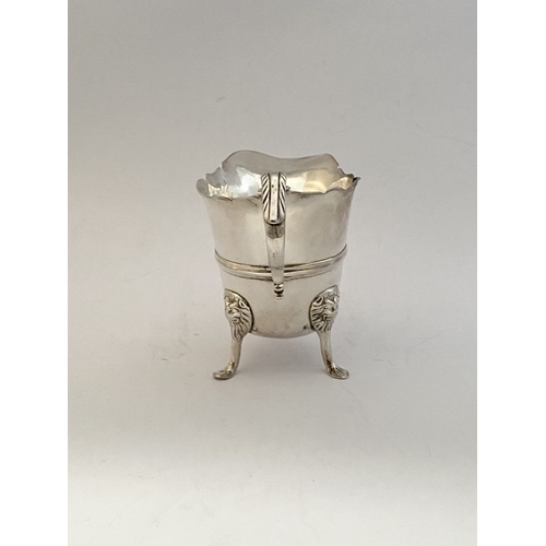 20 - A GEORGE II IRISH SILVER CREAM JUG, Dublin c.1750, nice simple form with gadrooned rim, double scrol... 